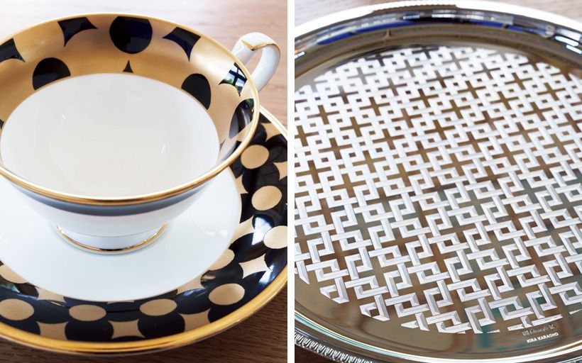 生命を繫ぐ祈りが込められた「角つなぎ」文様のトレーはクリストフル、吉祥文様の「南蛮七宝」のティーカップはノリタケとの共同作品。