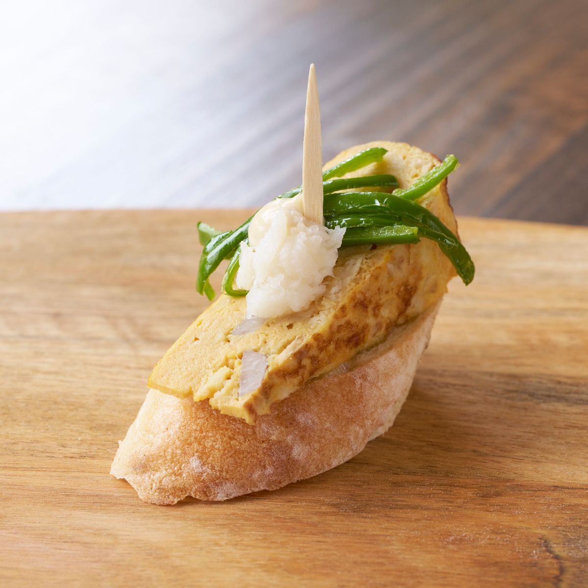 「味間いもと塩鱈 地卵のトルティージャ」。