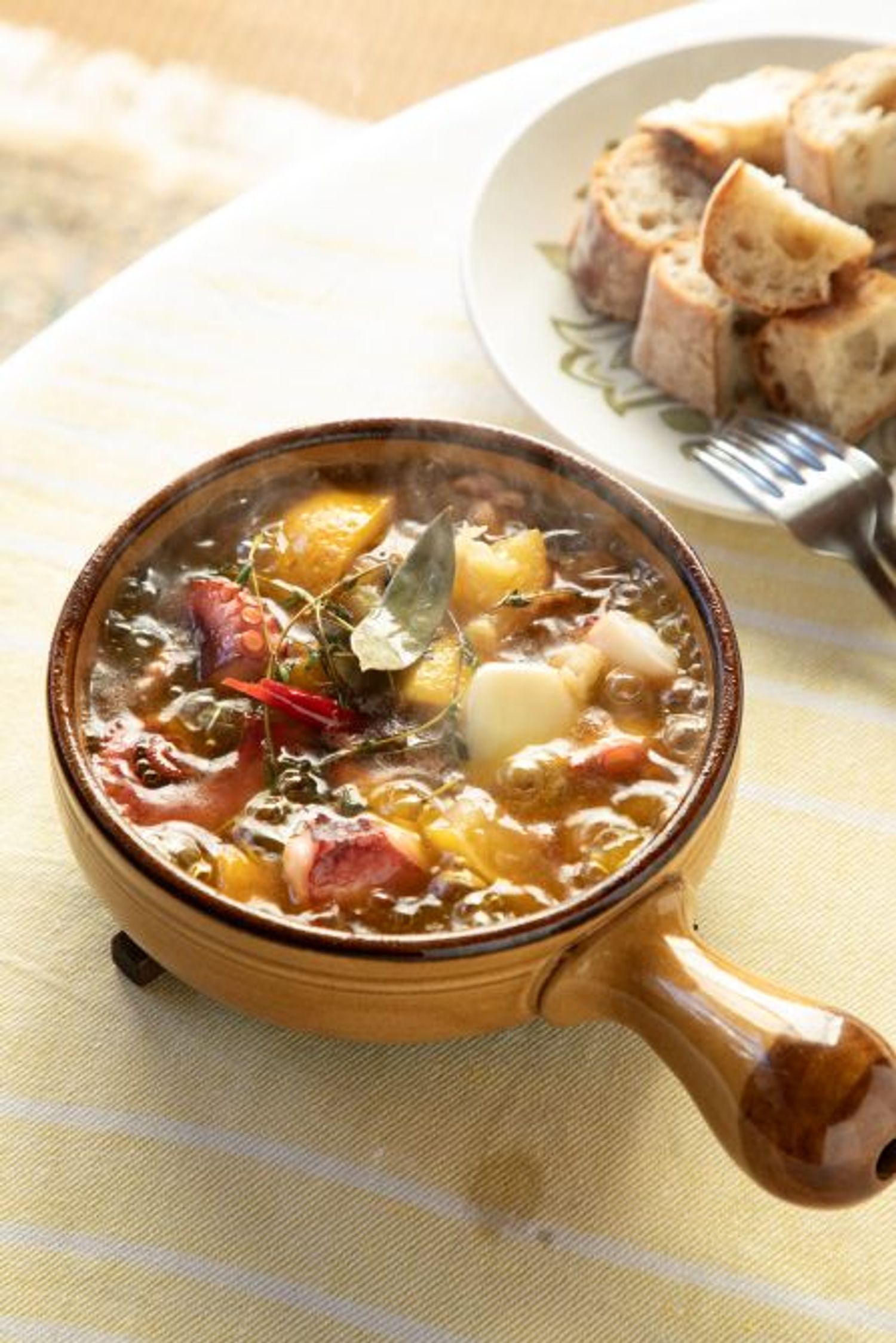 塩柚子とたこのアヒージョ。