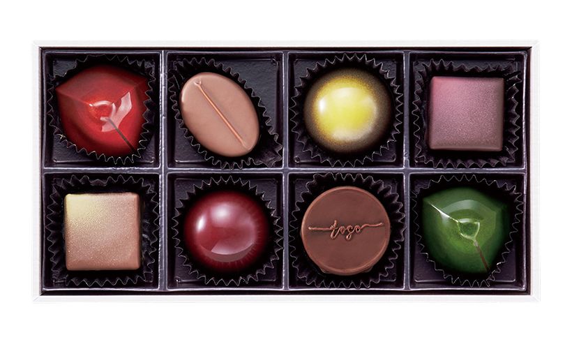ショコラティエ マサール バイ トウゴマツダの「ボンボンショコラボックス トーゴ」 8個⼊ 5,400円。代表作「キャラメル アグリューム」（写真左上）をはじめ8種のボンボンショコラを一度に楽しめる。